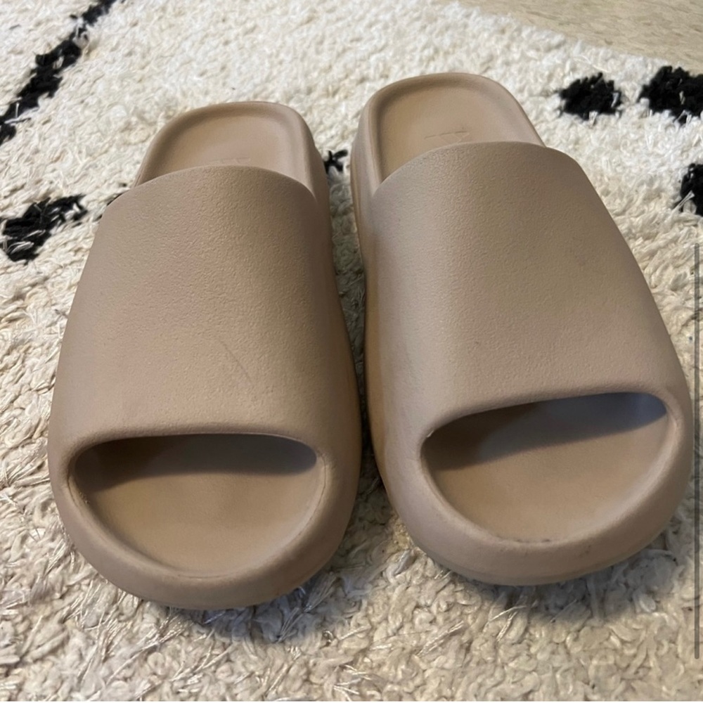 basically brand new yeezy slides 9.5, worn once going for $100